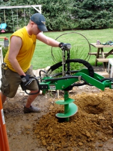 Using the "One Man Auger" to drill for the Footers